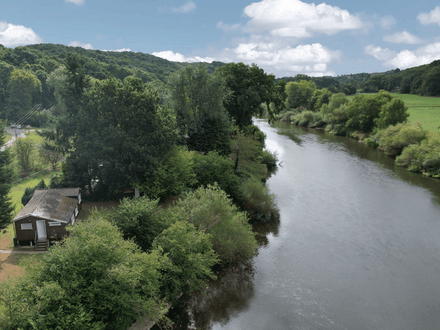 Enjoying a tranquil and picturesque riverbank setting with stunning views over the River Severn and surrounding countryside, this two bedroom timber chalet is also located in close proximity to the Severn Valley Railway and is set within attractive gardens.